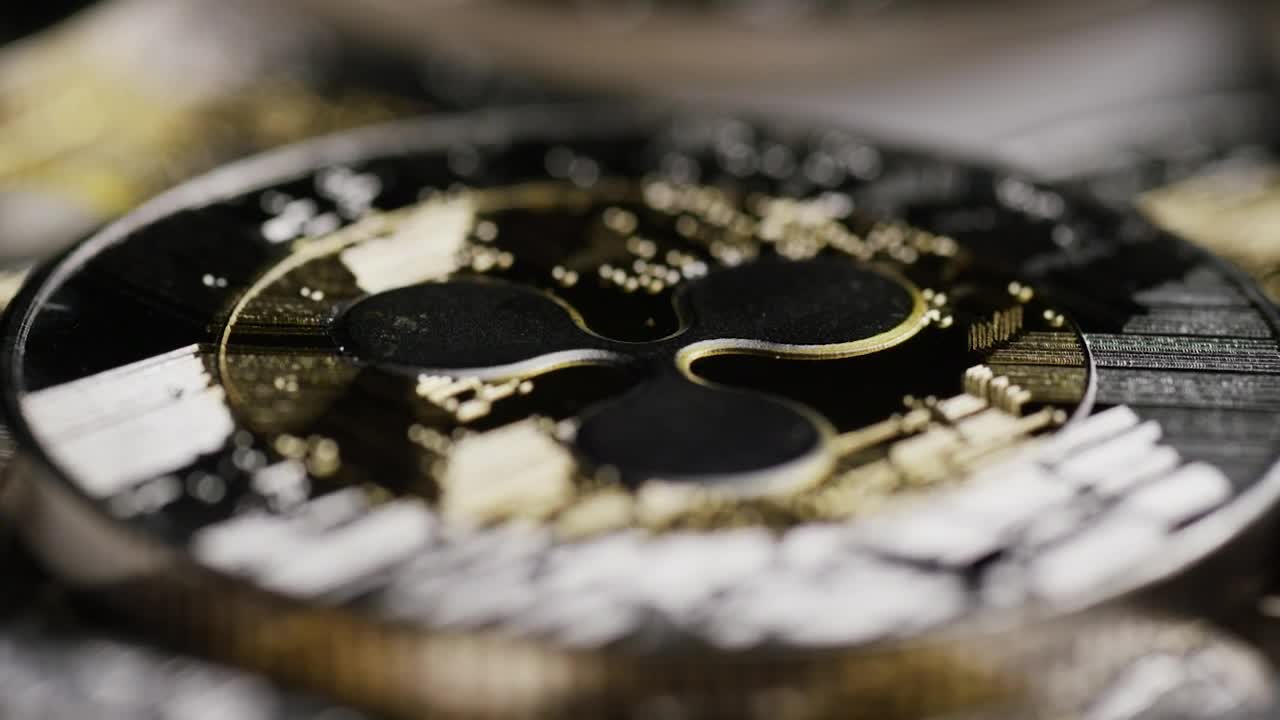 Free Stock Video Shining Ripple Bitcoin Coins Slowly Spinning Live Wallpaper