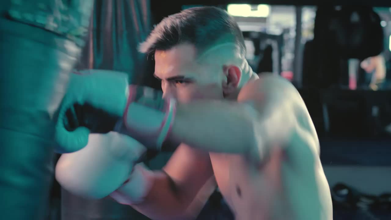 Free Stock Video Shirtless Athlete Training With A Punching Bag Live Wallpaper