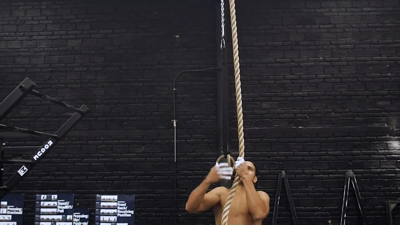 Free Stock Video Shirtless Man Rope Climbing At The Gym Live Wallpaper