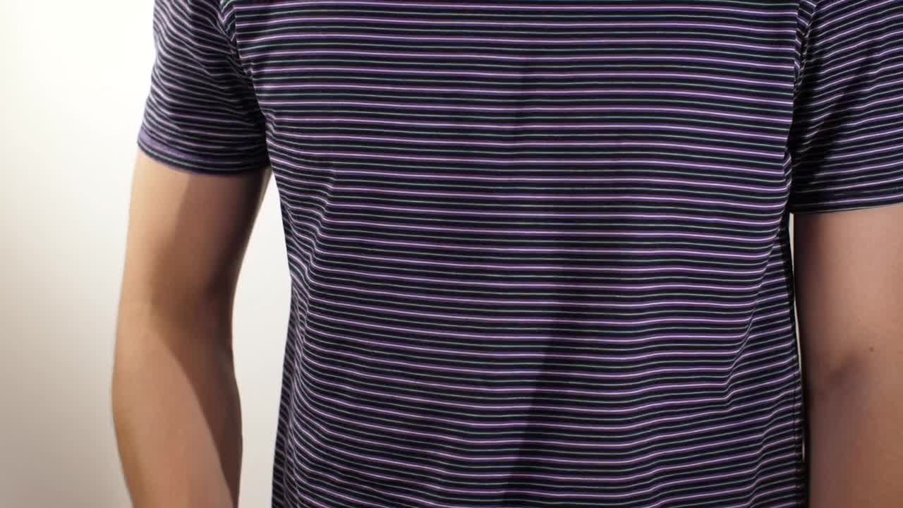 Free Stock Video Showing A Microphone On A Spys Chest Live Wallpaper