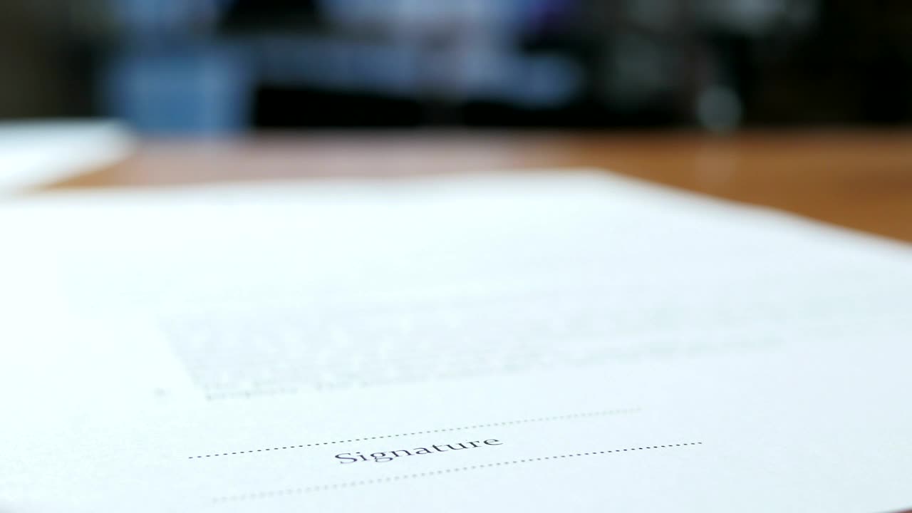 Free Stock Video Signing A Contract With A Pen Close Up Live Wallpaper