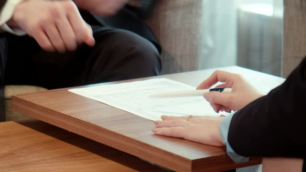 Free Stock Video Signing On A Contract On A Wooden Table Live Wallpaper