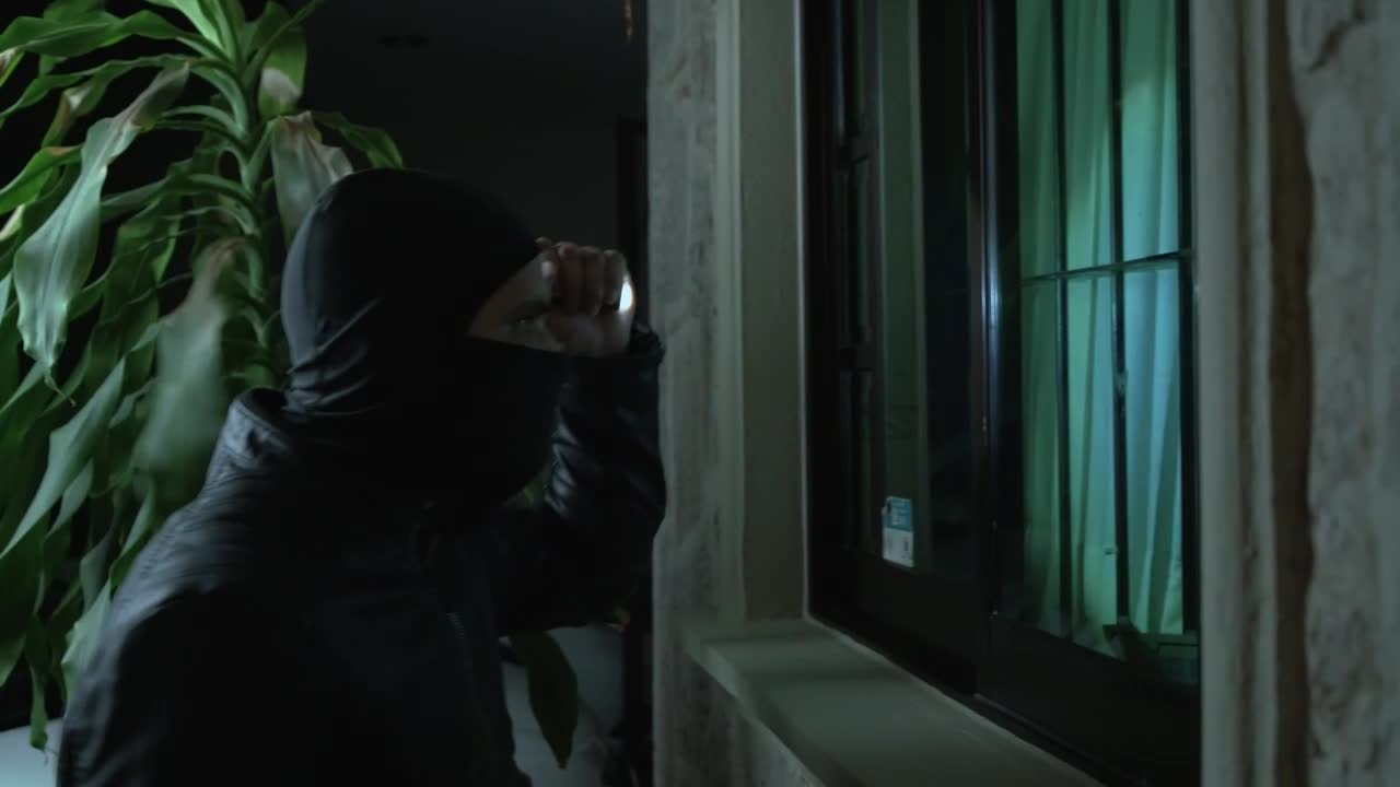 Free Stock Video Silent Thief Leaning Out Of A House Window Live Wallpaper