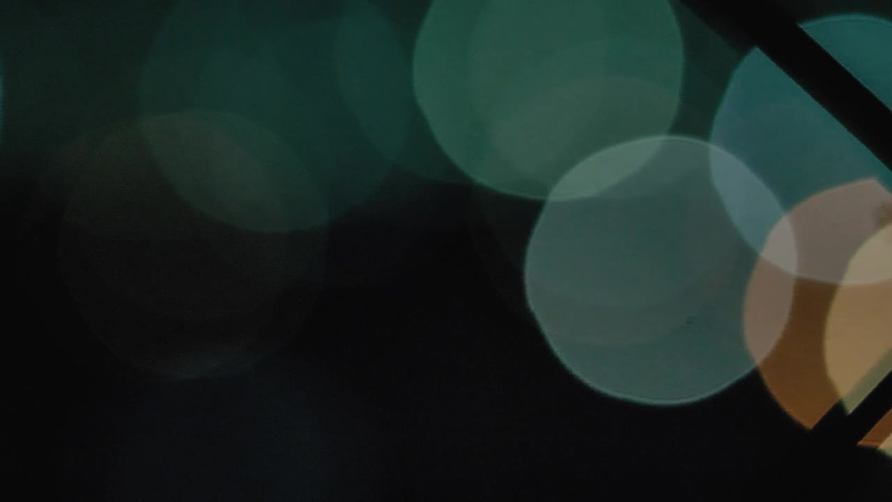 Free Stock Video Silhouette Of A Fence With Defocused Lights In The Background Live Wallpaper