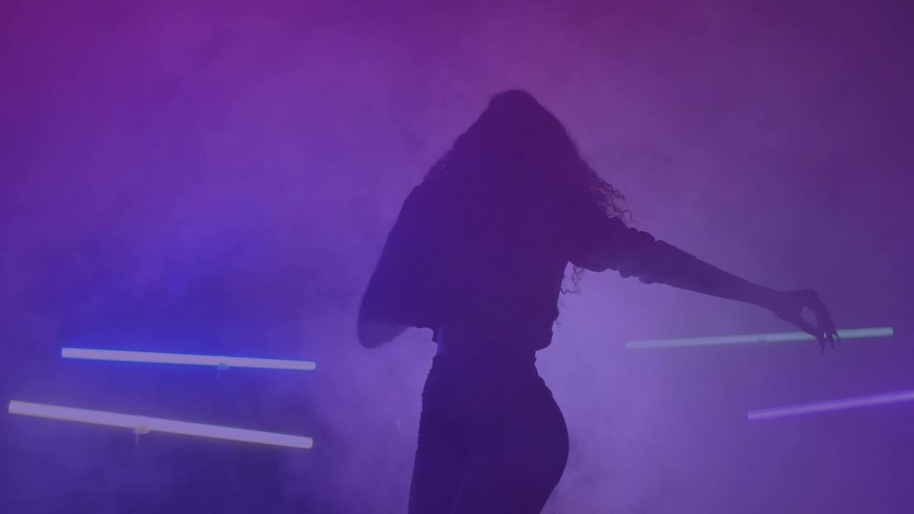 Free Stock Video Silhouette Of A Girl Dancing Energetically In The Dark Live Wallpaper