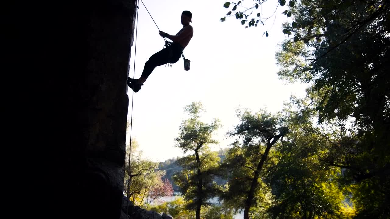 Free Stock Video Silhouette Of A Man Doing An Abseil Live Wallpaper