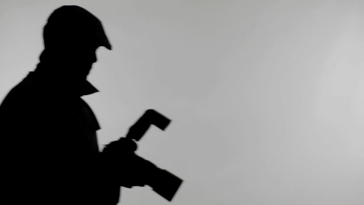 Free Stock Video Silhouette Of A Spy Taking Photos Live Wallpaper