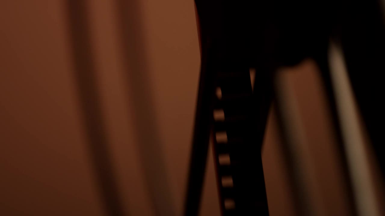 Free Stock Video Silhouette Of An Old Film Spinning Live Wallpaper