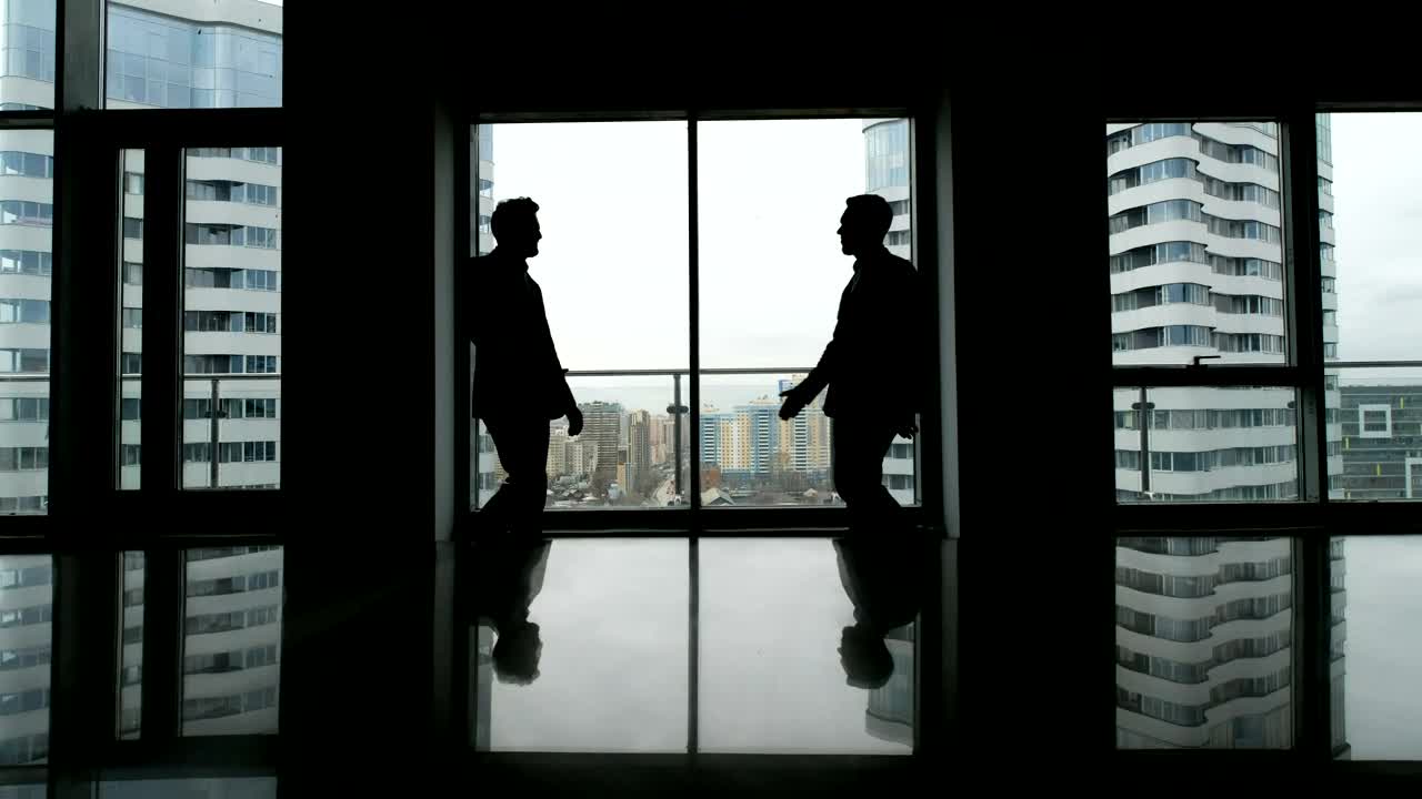 Free Stock Video Silhouette Of Business Handshake In Skyscraper Live Wallpaper
