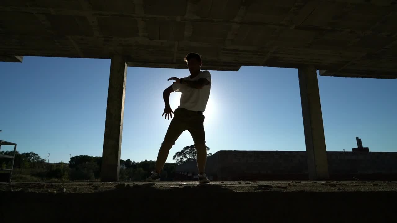 Free Stock Video Silhouette Of Man Dancing In An Abandoned Building Live Wallpaper