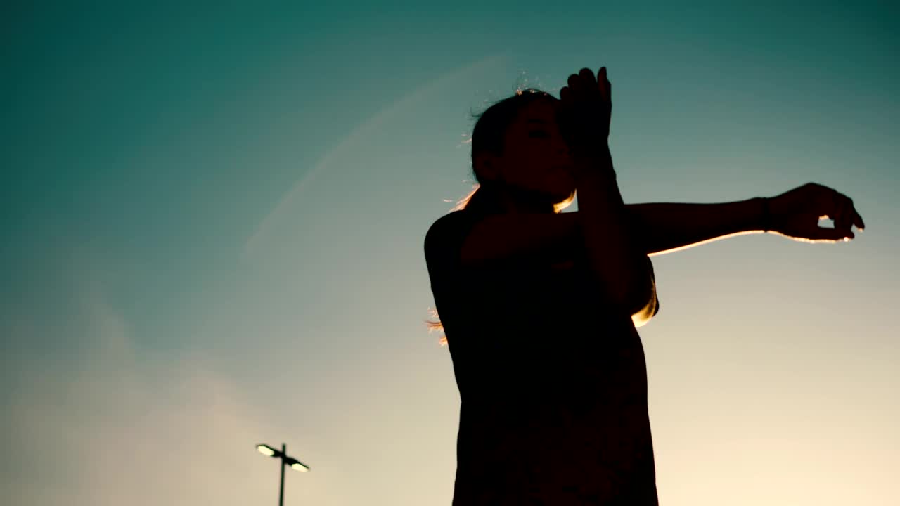 Free Stock Video Silhouette Of Woman Stretching Her Arms Live Wallpaper