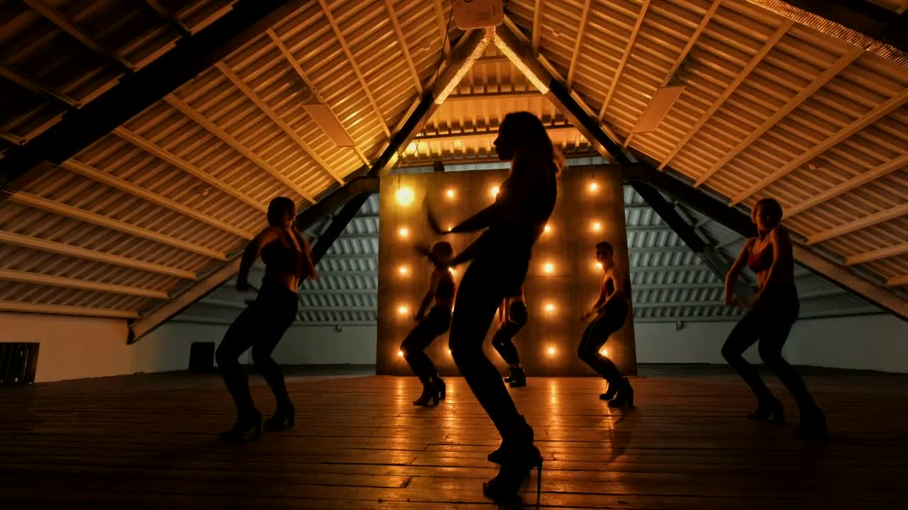 Free Stock Video Silhouettes Of Dancing Girls Performing At A Dark Stage Live Wallpaper