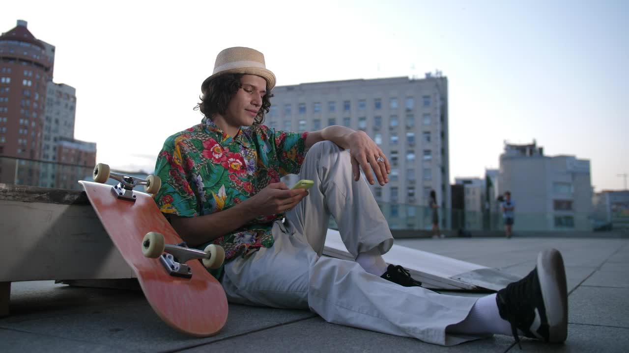 Free Video Stock Skater Relaxing In The City Live Wallpaper