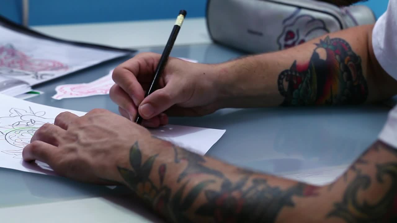 Free Video Stock Sketching A New Tattoo Design Live Wallpaper