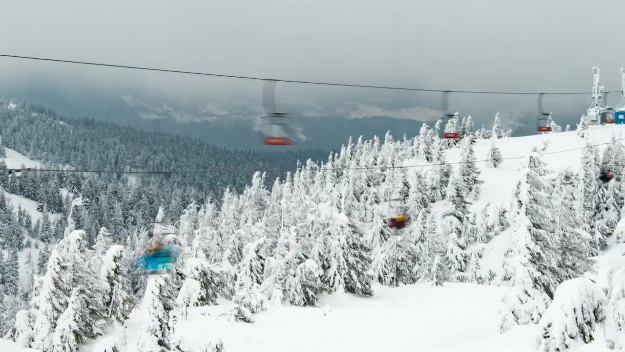 Free Video Stock Ski Lift Over A Frozen Mountain Forest Live Wallpaper