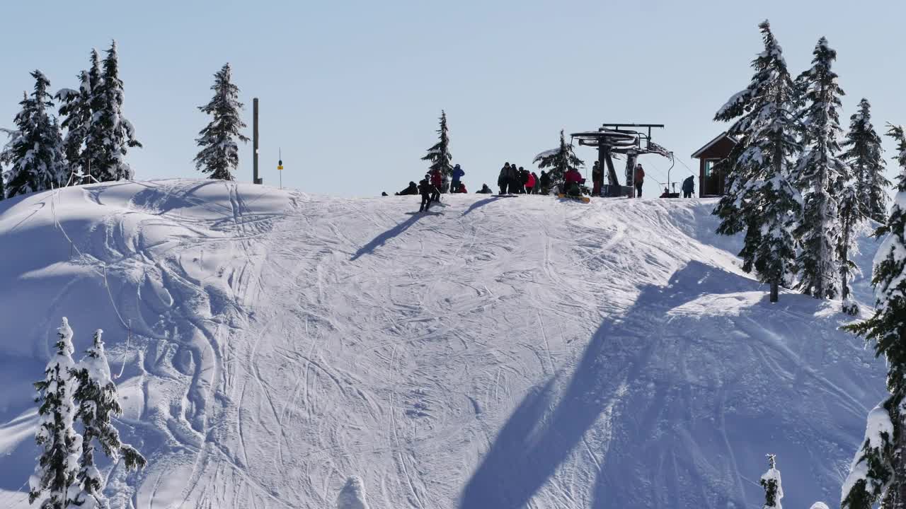 Free Video Stock Skiers On A Snowy Slope Live Wallpaper