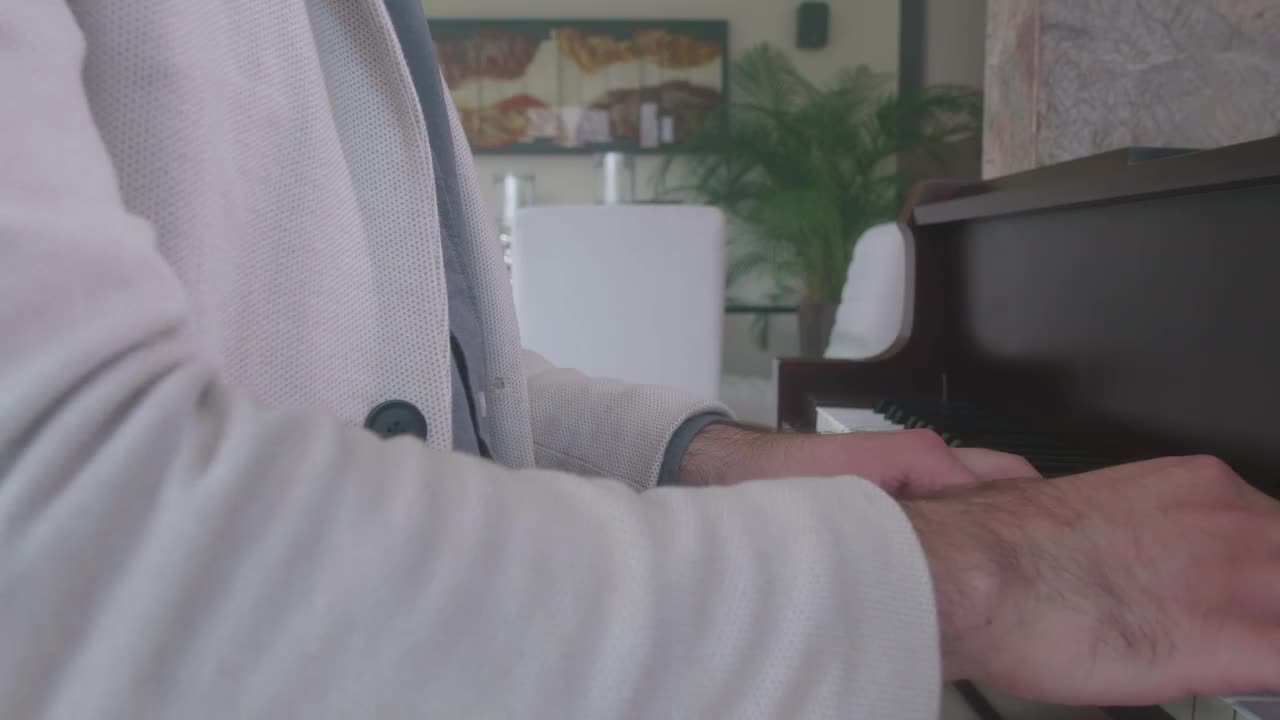 Free Video Stock Skilled Pianist Playing A Grand Piano In An Elegant Lobby Live Wallpaper