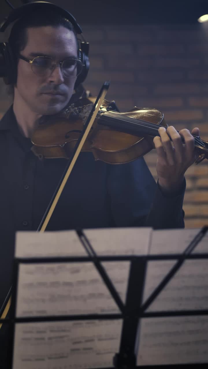 Free Video Stock Skilled Violinist Playing With Sheet Music Live Wallpaper