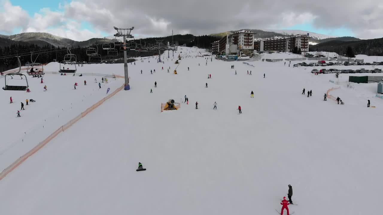 Free Video Stock Sky Lift And Skiers In The Snowy Mountain Live Wallpaper