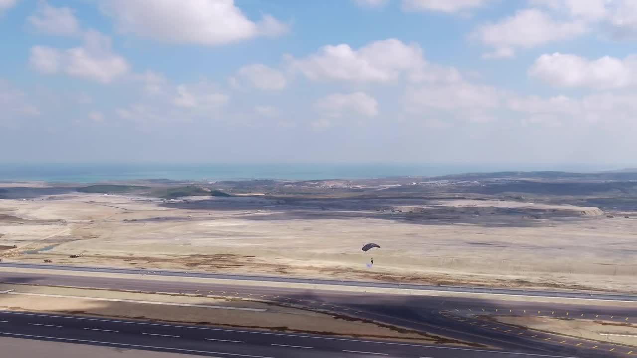Free Video Stock Skydiver Landing At A Festival Live Wallpaper