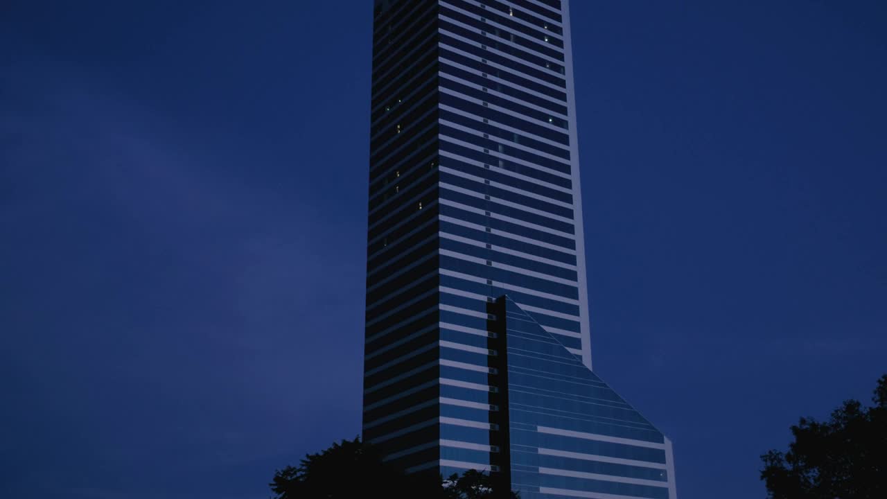 Free Video Stock Skyscrapers During Darkness Falls At Night Live Wallpaper