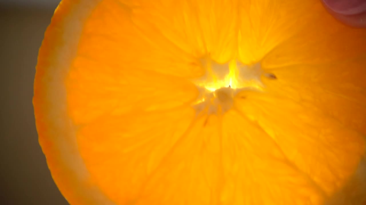 Free Video Stock Slice Of Wet Orange In A Very Close Shot Live Wallpaper
