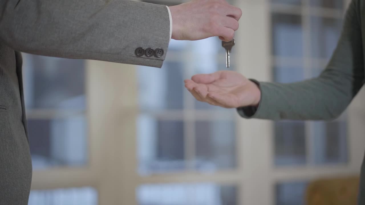 Free Video Stock Slow Motion Offer Of House Key And Handshake Live Wallpaper