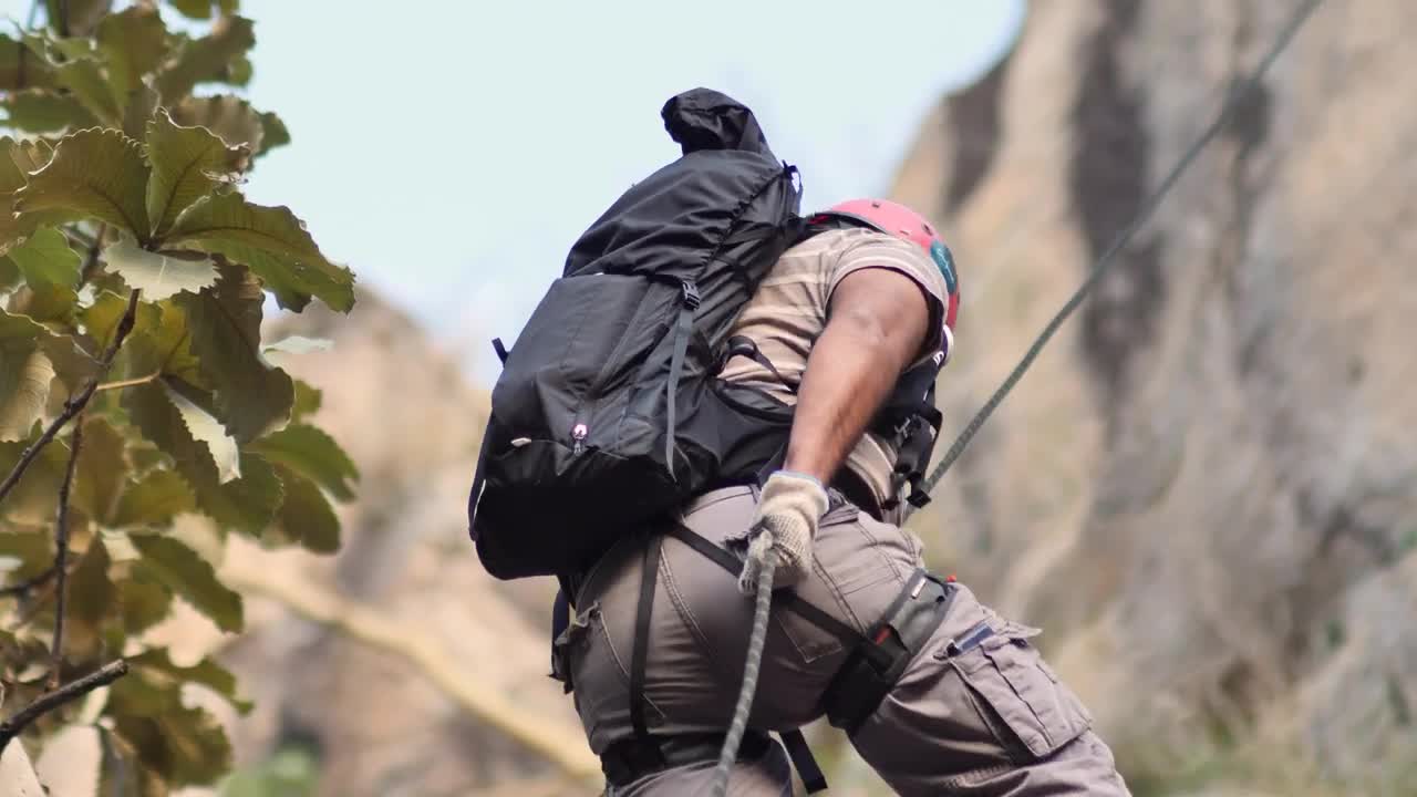 Free Video Stock Slowly Descending From A Mountain With A Harness Live Wallpaper