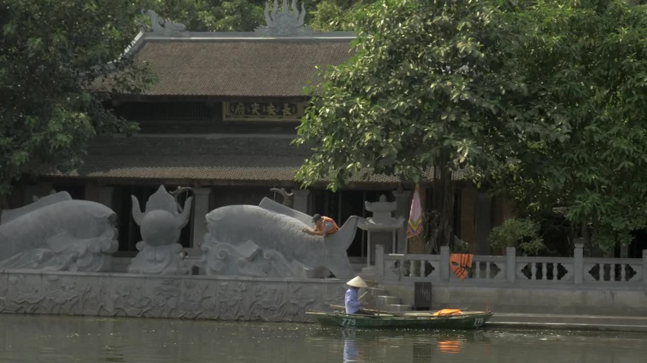 Free Video Stock Small Boat In A Hanoi River Live Wallpaper