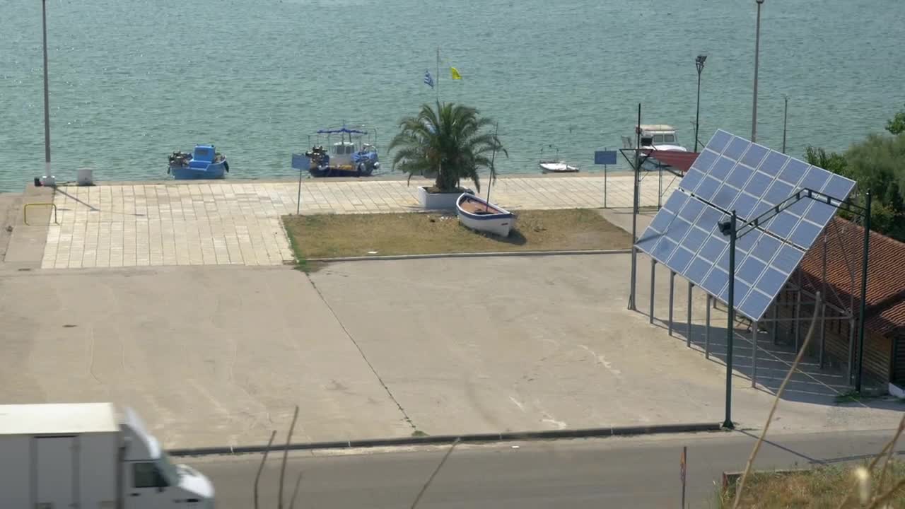 Free Video Stock Small Boats By A Solar Panel Live Wallpaper