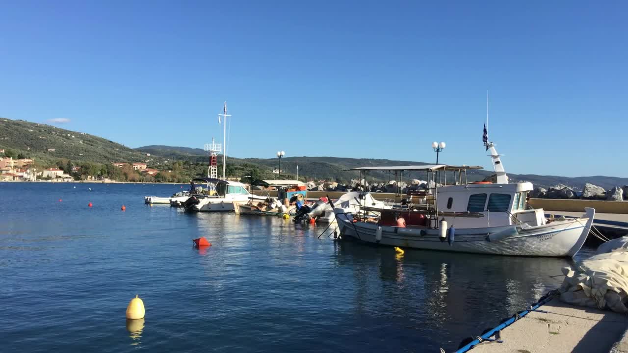 Free Video Stock Small Boats In A Village Harbor Live Wallpaper