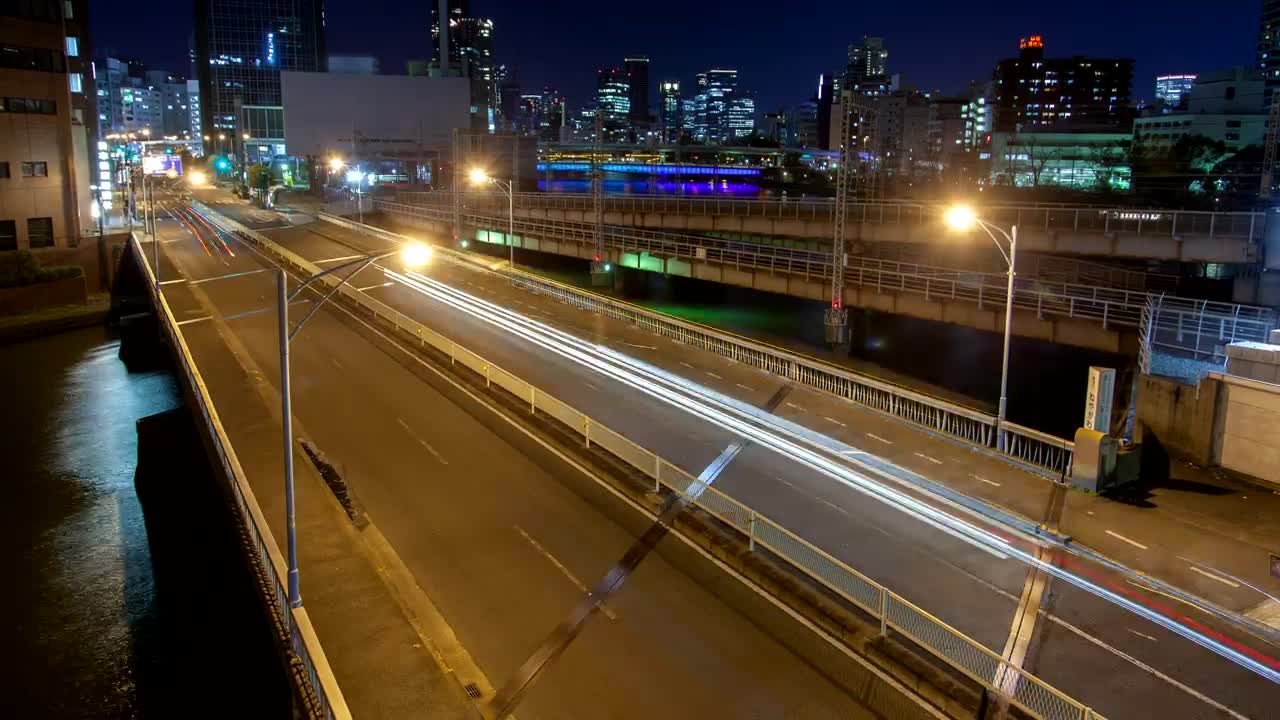 Free Video Stock Small Bridges Over A Canal In A City At Night Live Wallpaper