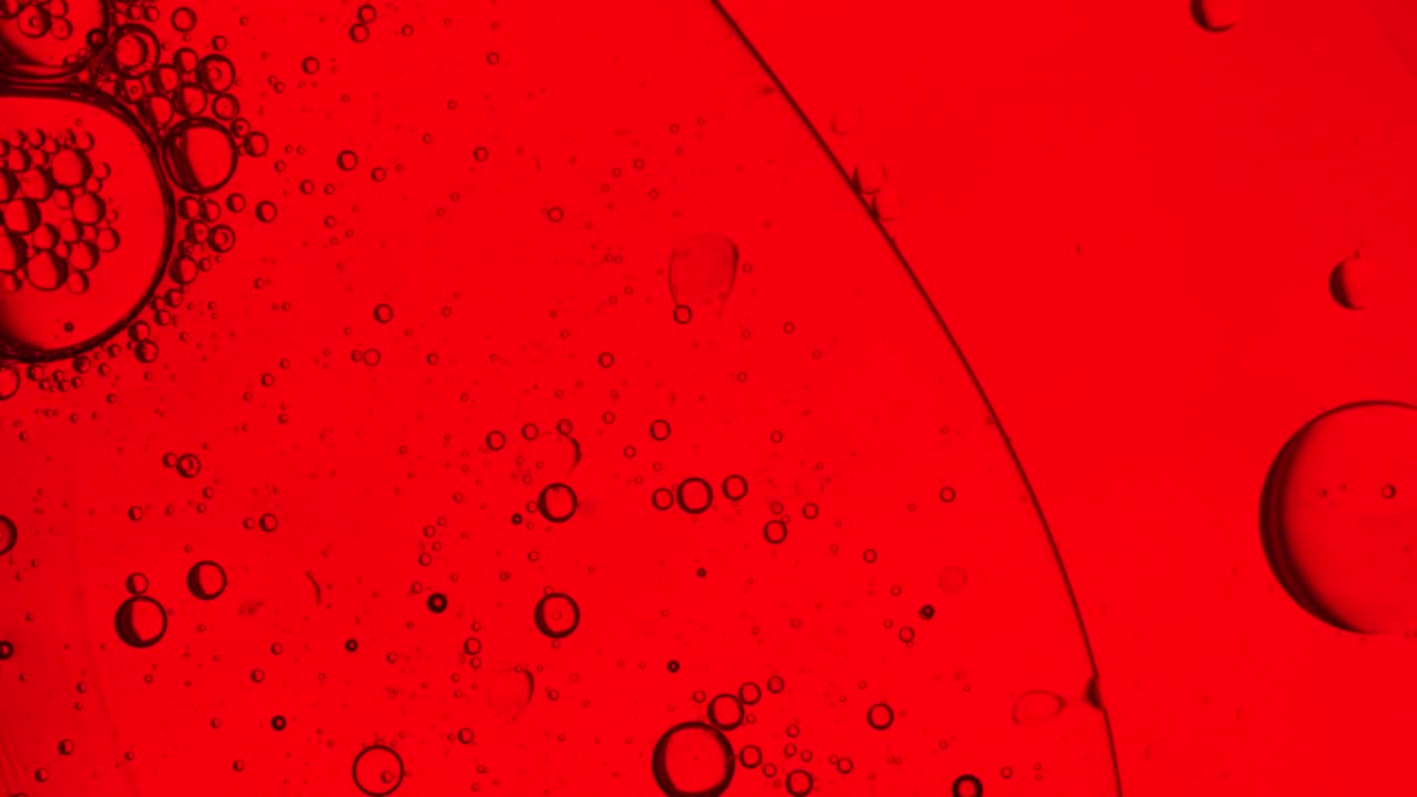 Free Video Stock Small Bubbles In A Liquid On A Red Background Live Wallpaper