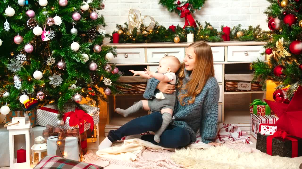 Free Video Stock Small Family Gathering At A Christmas Tree Live Wallpaper