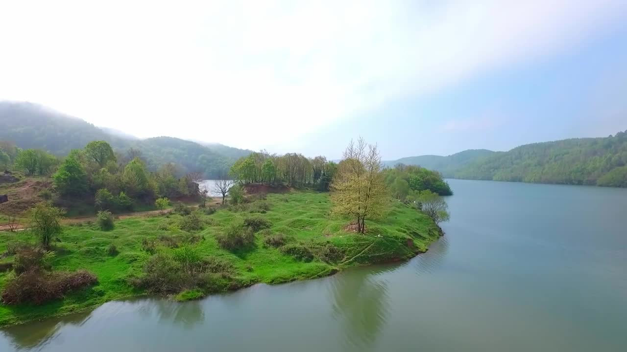 Free Video Stock Small Island In The Middle Of A Lake Live Wallpaper