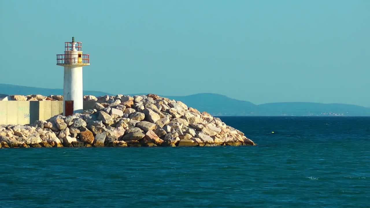 Free Video Stock Small Lighthouse On The Seashore Live Wallpaper