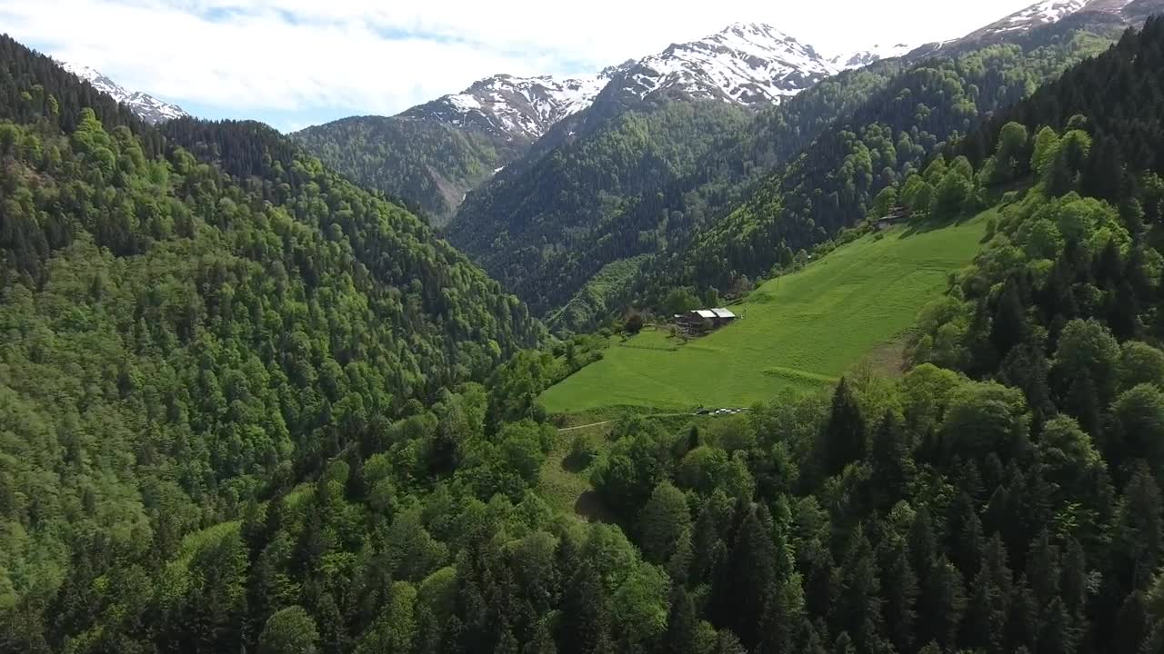 Free Video Stock Small Meadow And A House In The Mountain Live Wallpaper