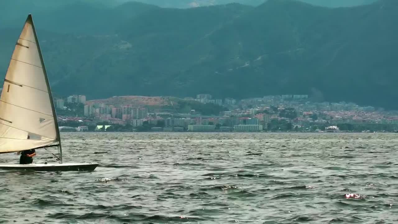 Free Video Stock Small Sailboat Sailing The Sea Live Wallpaper