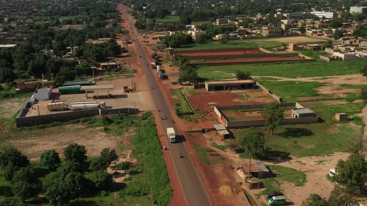 Free Video Stock Small Village In Mali With Traffic Heading Through Live Wallpaper