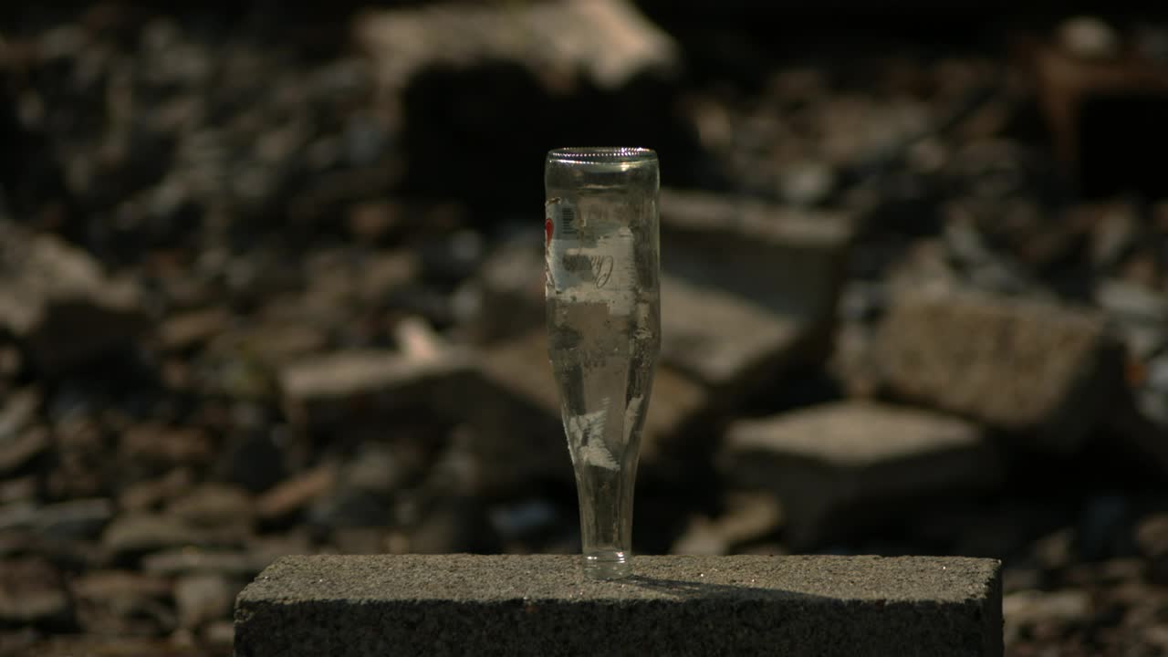 Free Video Stock Smashing A Glass Bottle With A Sledge Live Wallpaper