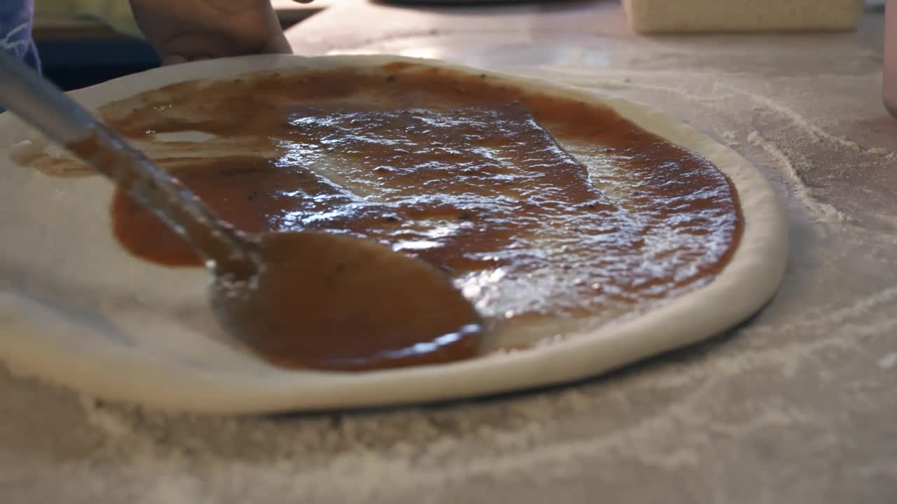 Free Video Stock Smearing Sauce On The Pizza Live Wallpaper
