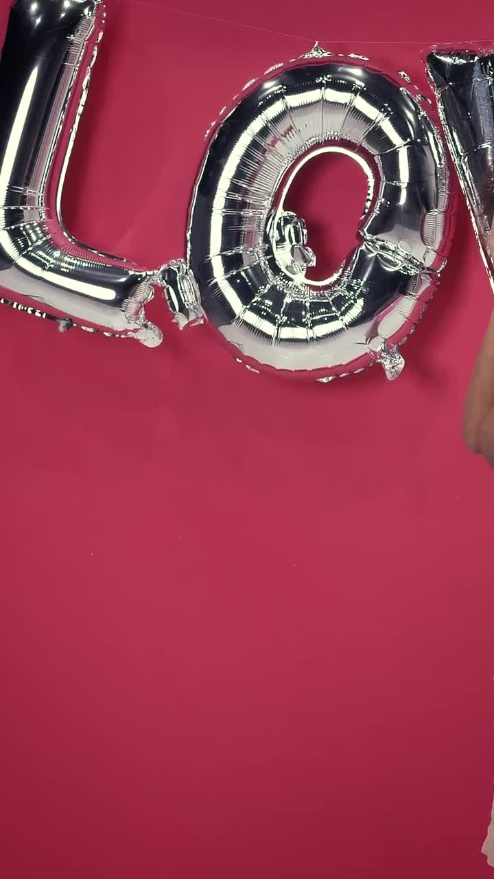 Free Video Stock Smiling And Charming Girl On A Red Background On Valentines Live Wallpaper