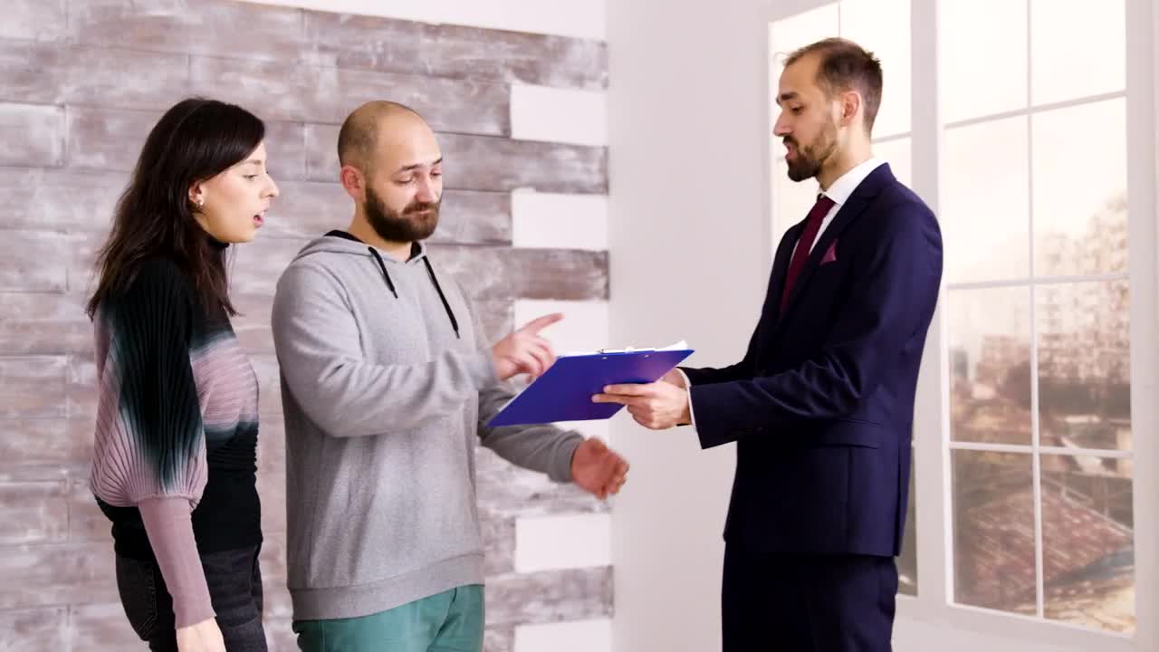 Free Video Stock Smiling Couple Signs Real Estate Investment Contract And Hugs Live Wallpaper