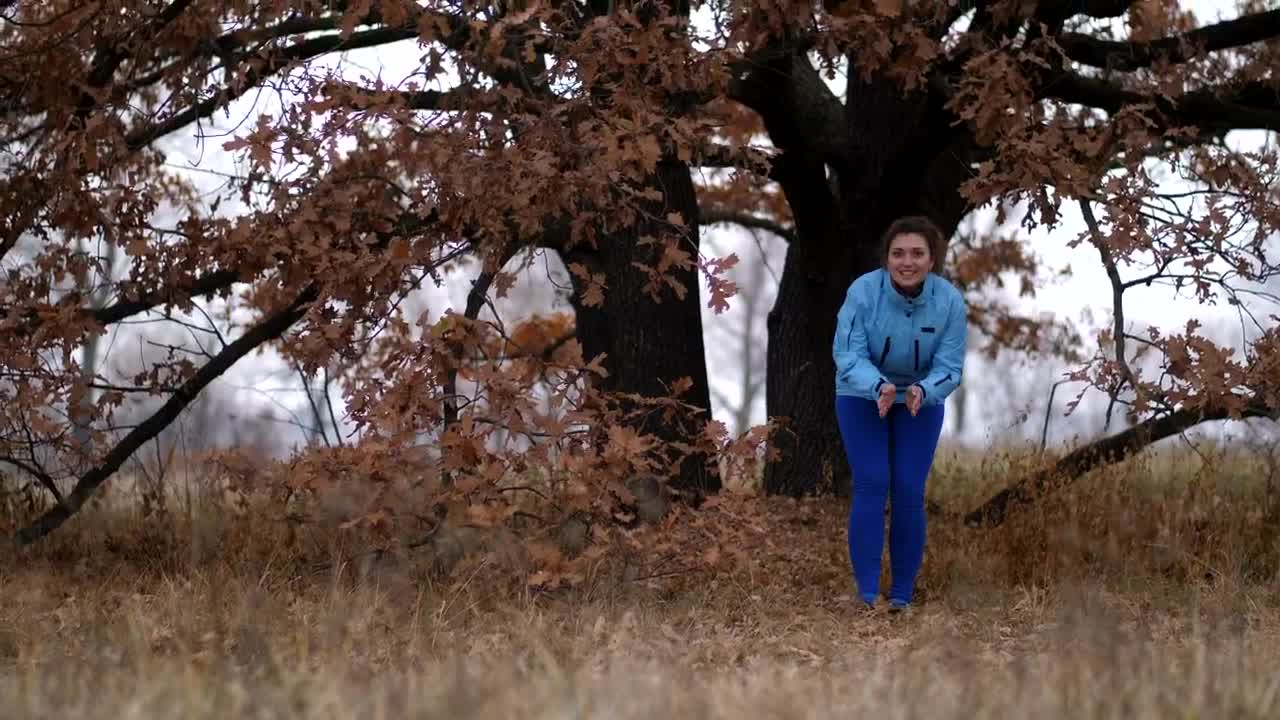 Free Video Stock Smiling Woman Calling Her Dog In The Rain Live Wallpaper