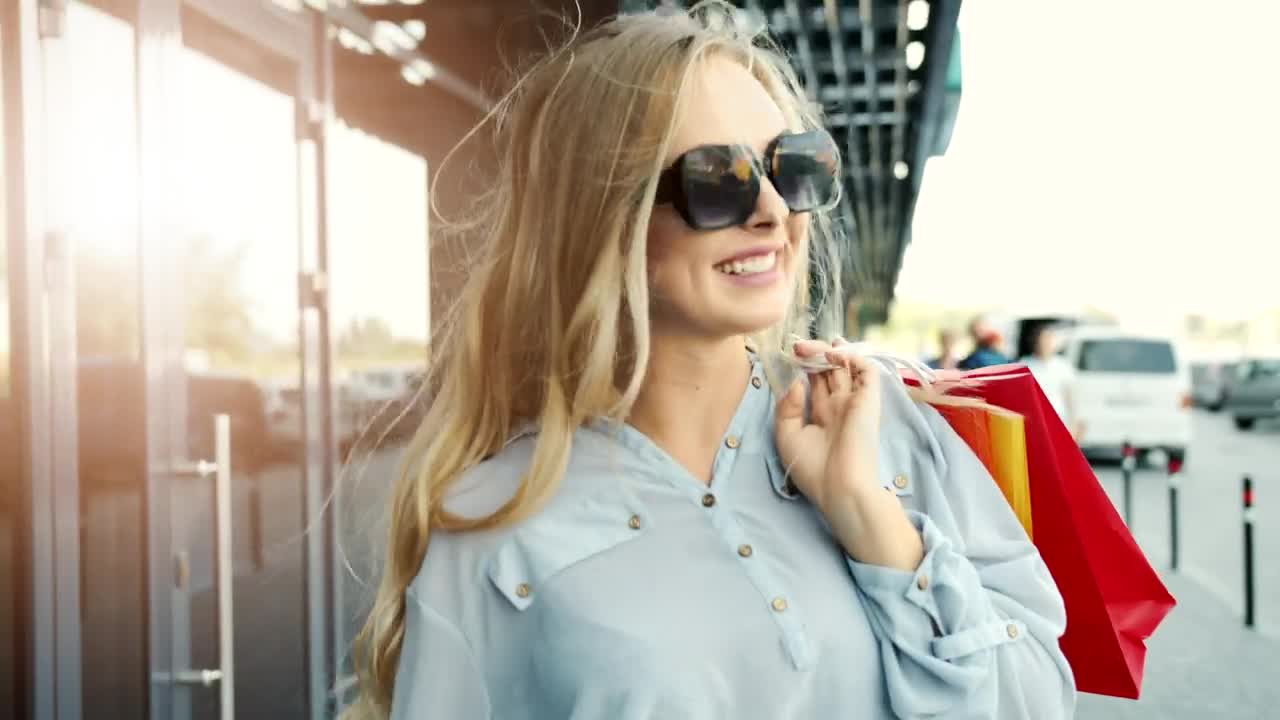 Free Video Stock Smiling Woman Walks Outside Shopping Mall Live Wallpaper