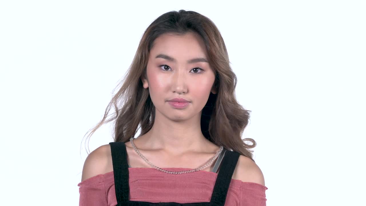 Free Video Stock Smiling Woman With A White Background Live Wallpaper