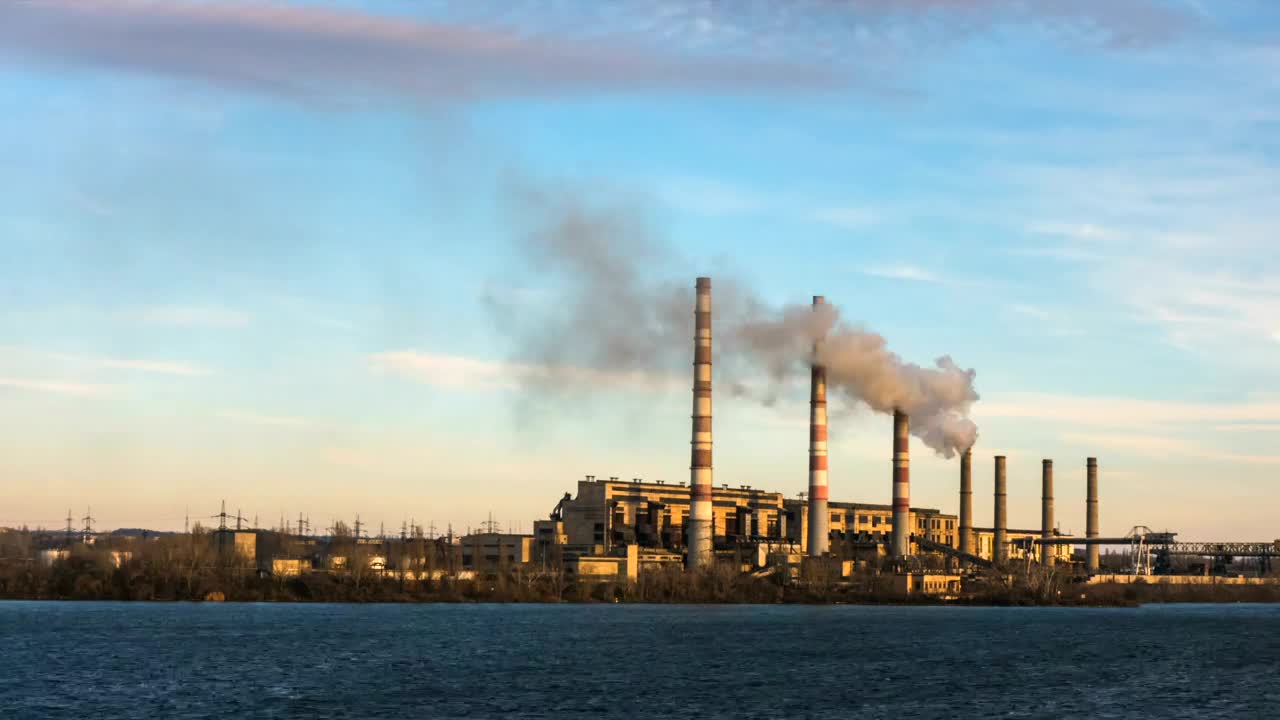 Free Video Stock Smoke Coming Out Of A Power Plant Near The River Live Wallpaper