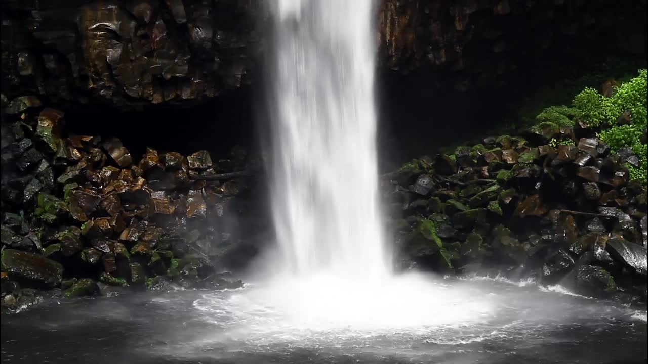 Free Video Stock Smooth Rocks At The Base Of A Waterfall Live Wallpaper