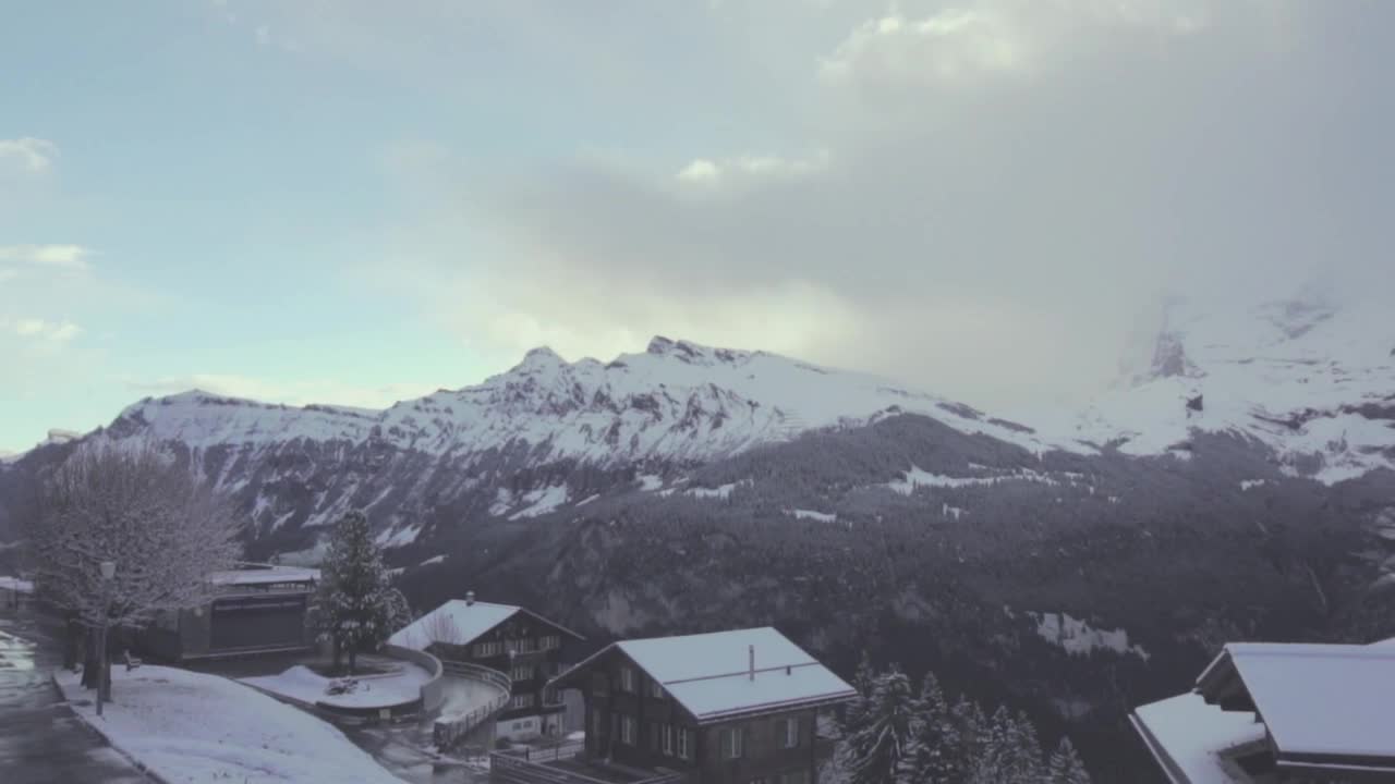 Free Video Stock Snow Capped Mountains And A Small Town Live Wallpaper