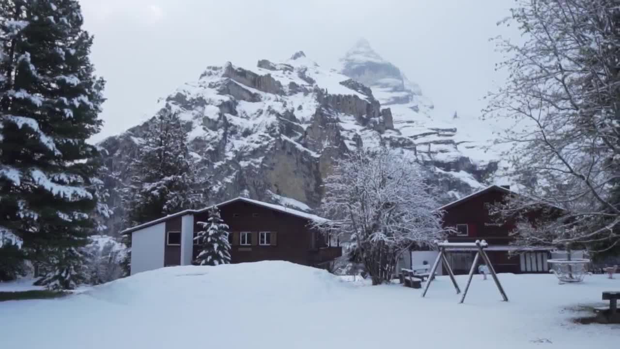 Free Video Stock Snow Covered Cabins At Base Of A Mountain Live Wallpaper